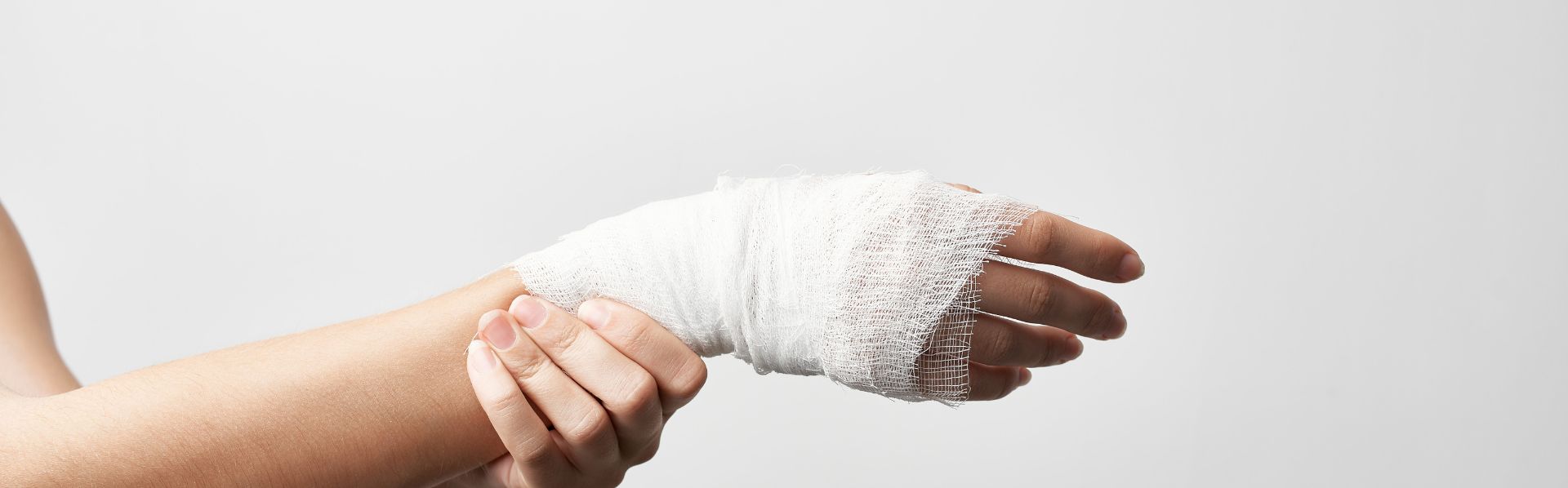 injury to a woman's wrist and hand