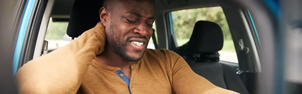 Man in pain after car accident